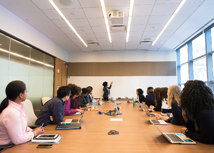 conference meeting room occupied by workers