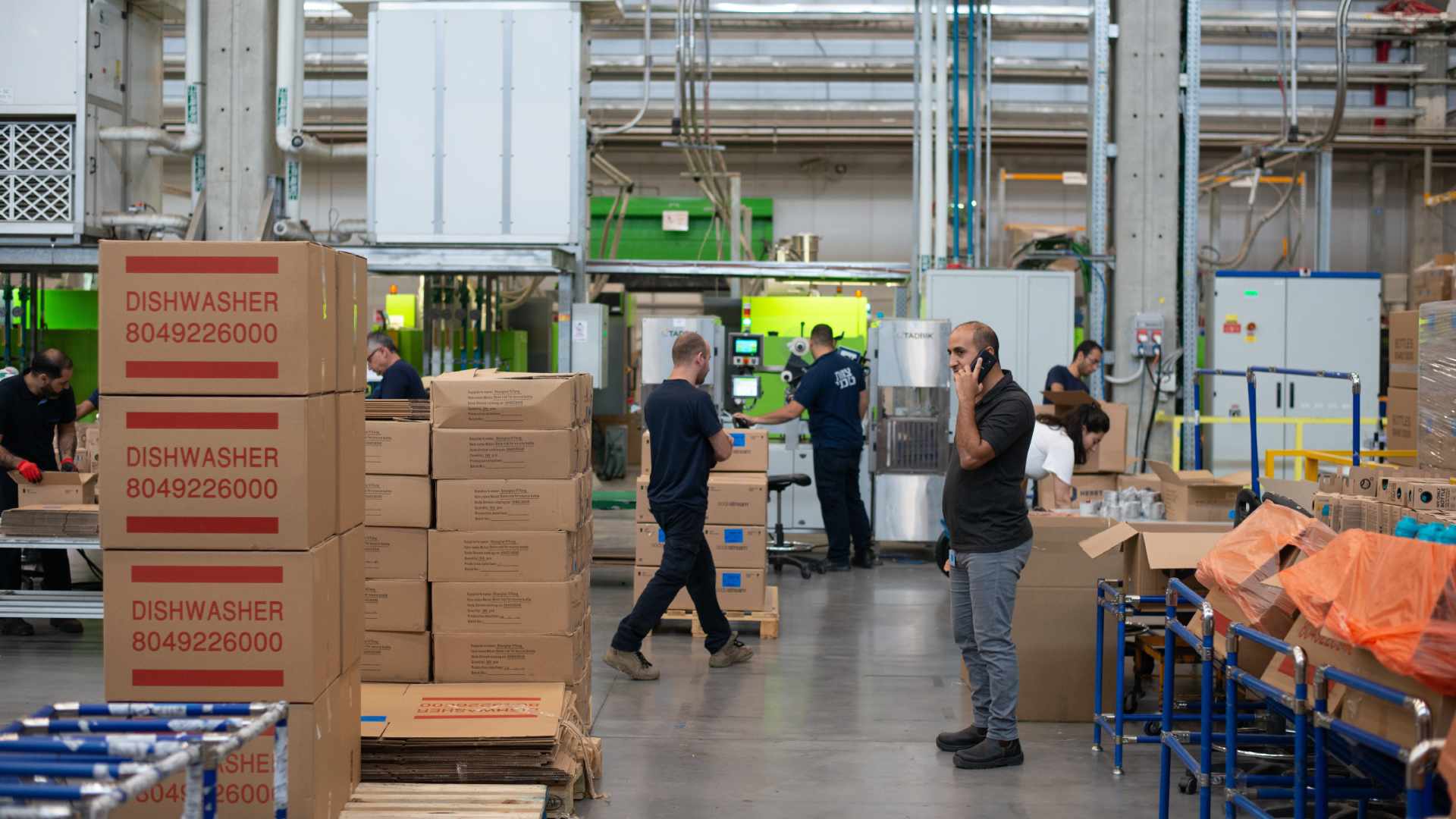 a manufacturing and storage warehouse with workers